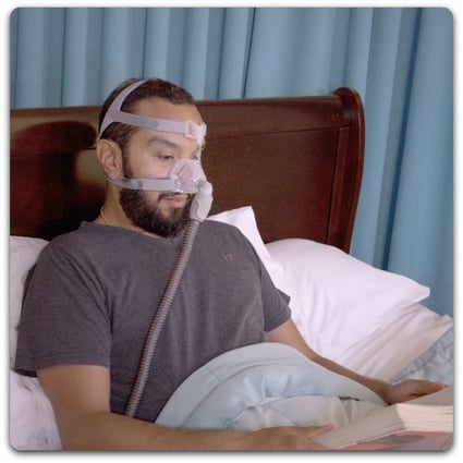 couple_in_bed_PAP_device_for_sleep_apnea_3